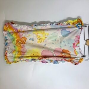 Dolls Kill x Care Bears Ruffle Pillow Case Pastel Rainbow Character Print